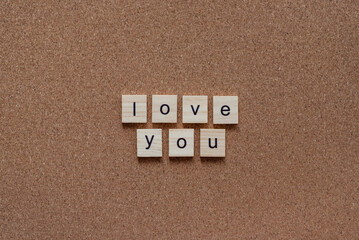 love you wooden letters on cork board