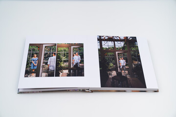 pages of photobook from photo shoots of a beautiful happy couple in the garden
