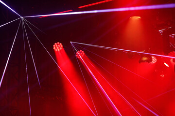 laser and LED stage lighting fixtures at the show