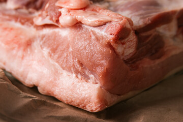 A piece of raw meat on craft paper