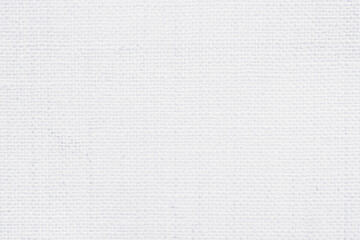 White fabric jute hessian sackcloth canvas woven gauze texture pattern in light white color blank. Natural linen and cotton cloth texture as clean background empty for decoration.