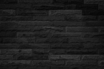 Abstract dark brick wall texture background pattern, Empty brick wall  surface texture. Brickwork painted black color interior old blank concrete grid uneven, Home office design backdrop decoration.
