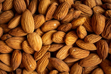 Top view of almonds in a heap. Use for Healthy snack concept.
