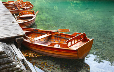 wooden pleasure boats are waiting for tourists