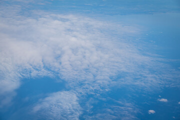Obraz premium Capturing the fluffy white clouds and the blue sky