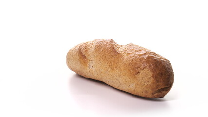 beautiful loaf of white bread, ready for breakfast on white background. Fresh bread, just from the oven on turntable isolated.