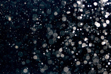 Glittering stars of black bokeh