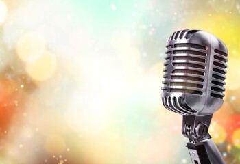 Retro style classic microphone on background