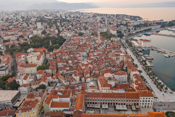 Fototapeta na wymiar Aerial drone west side view of Diocletian Palace by riva in Split old town in Croatia in sunrise