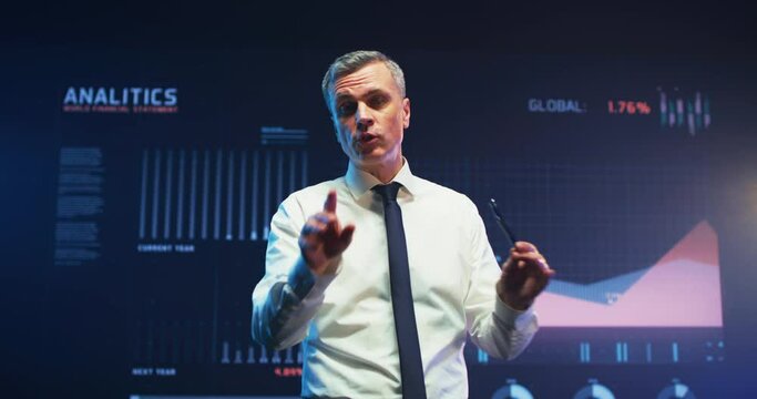 Confident businessman explaining strategy to audience