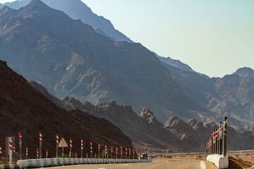tourist bus travels on the road to Wady Megarah, Sinai, Egypt