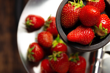 Hookah with strawberry flavour close up on dark background