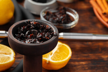 Shisha parts, tobacco and lemons close up