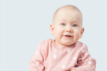 Child portrait on a blue background with place for your text.