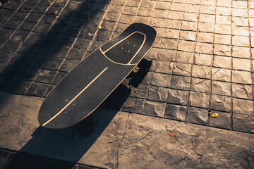 Close up surf skate or skateboard at park sunset © oatawa