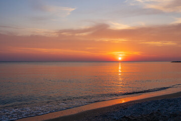 Fototapeta na wymiar sunset on the beach in Tuscany, Italy.