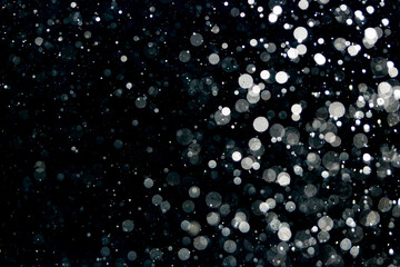 Glittering stars of black bokeh