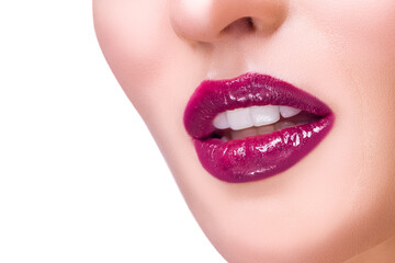 Obraz premium Skin Care Beauty Portrait. Macro Closeup Shot of Female Vivid Purple Lips and Perfect White Teeth Isolated Over White
