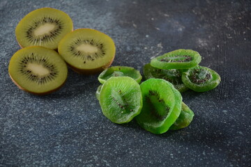 Sliced kiwi fruit  in pieces  fresh and dried