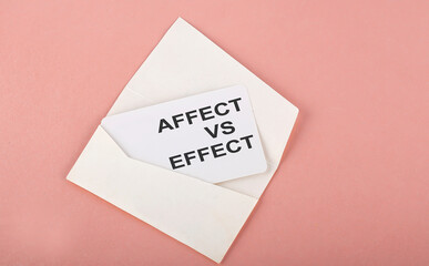 Word Writing Text Affect vs Effect on card on the pink background