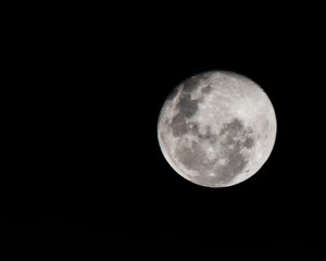 full moon over black