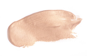 Foundation smear on a white background. A speck of makeup isolated.
