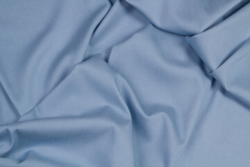 Fabric jeans fold top view. Blue textile	
