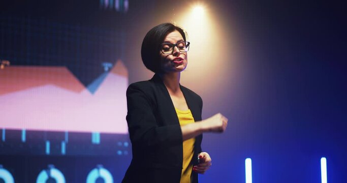 Business coach talking against graphs
