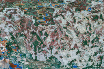 Polished and abraded paint on an old wooden wall of a boat.