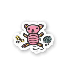 Amigurumi handmade sticker. Knitting a perfect teddy-bear, using needle pins and wool clew balls. Handmade badge for designs. Tenderly handmade crochet toy 