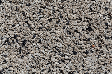 Crushed granite stones wall - close up