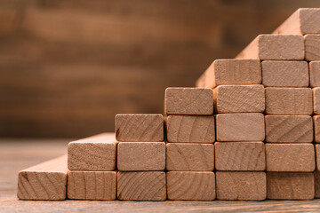 Wooden block ladder as a concept planning, risk and strategy in business