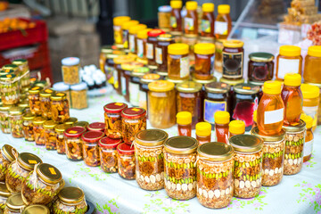 Pickled spiced delicacies and preserves on display at Kotor's farmers market,Kotor,Montenegro.