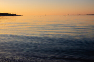 Fototapeta premium Yellow sunset on the sea
