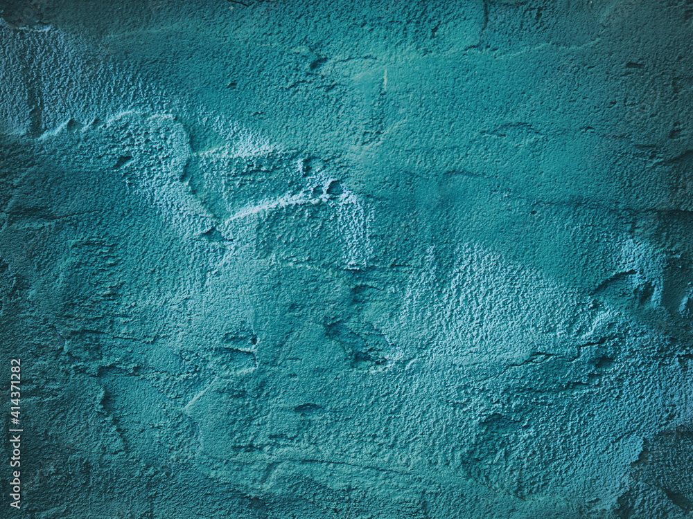 Aufkleber Background image of rough finish plaster texture in turquoise color with side lighting.