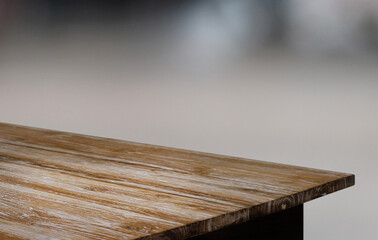Empty wooden table in front of abstract blurred background of coffee shop . can be used for display or montage your products.Mock up for display of product