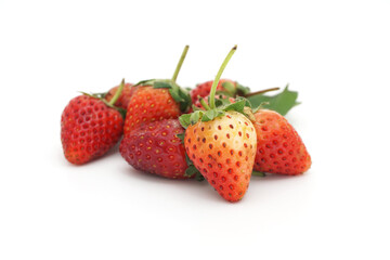 Group of fresh strawberries isolated on white background.