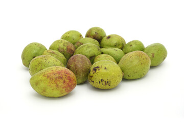 Pile of Chebulic Myrobalans isolated on a white background.