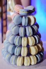 Pyramid of macaroons on candy bar