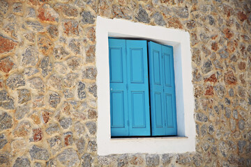 Fototapeta na wymiar A traditional retro door from a Greek Island