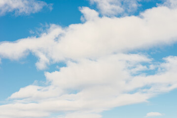 Naklejka na ściany i meble White clouds in blue sky.Winter clouds blue heaven background.