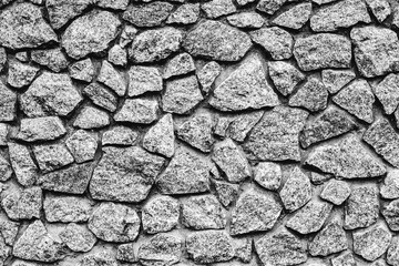 Texture of a brick wall with cracks and scratches which can be used as a background