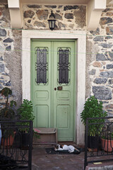 Fototapeta na wymiar A traditional retro door from a Greek Island