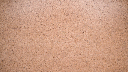 Closed up of panoramic brown cork board texture for banner background.