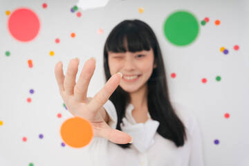 Cheerful beautiful asian thai long dark hair woman isolate over white party background.