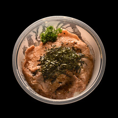 Beef rice bowl in a plastic bowl