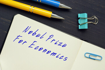 Business concept about Nobel Prize For Economics with sign on the page. - obrazy, fototapety, plakaty