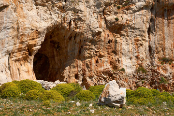massive limestone cave at a climbing crag on the beach near San Vito lo Capo, Sicily