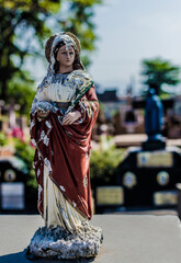statue of Holy Mary in the cemetery
