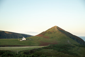 Mwnt church, Cardigan Wales. Next to hill. On sunny summer morning.